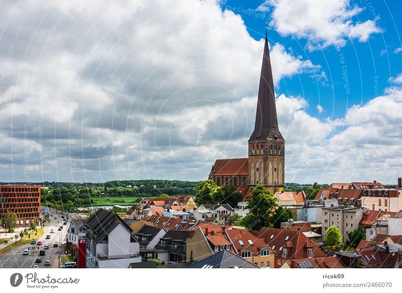View of the Hanseatic city of Rostock Relaxation Vacation & Travel Tourism House (Residential Structure) Nature Clouds Town Building Watercraft Belief