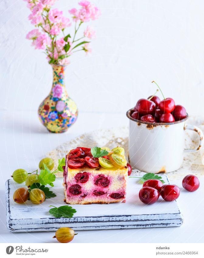 cheesecake with cherry berries Cheese Fruit Cake Dessert Candy Cup Table Eating Fresh Delicious Red White Gooseberry Cherry filling Slice background food sweet