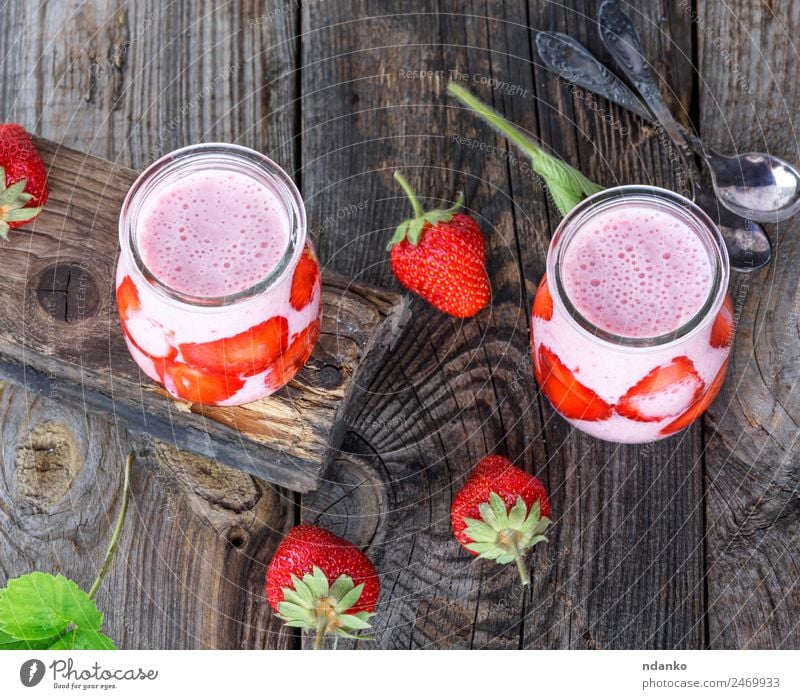 yoghurt with fresh strawberries Yoghurt Fruit Dessert Breakfast Diet Beverage Juice Glass Table Wood Eating Fresh Juicy Green Red Milkshake Strawberry