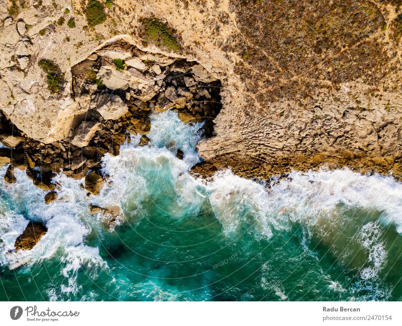 Aerial Drone View Of Dramatic Ocean Waves Crushing On Rocky Landscape Movement slow Aircraft rock beach Beach Abstract Vantage point Top Water Nature Beautiful