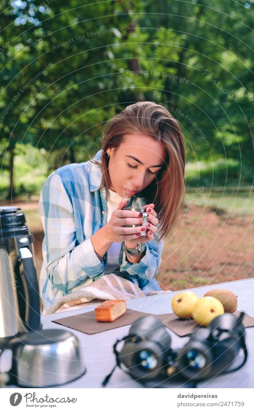 Woman holding cup of hot coffee sitting under blanket Fruit Breakfast Coffee Lifestyle Relaxation Leisure and hobbies Vacation & Travel Trip Adventure Camping
