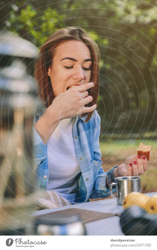 Woman eating cake in breakfast into the forest Fruit Eating Breakfast Coffee Lifestyle Relaxation Leisure and hobbies Vacation & Travel Trip Adventure Camping