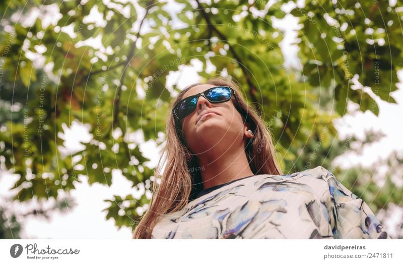 Woman with sunglasses standing over nature background Lifestyle Joy Happy Relaxation Leisure and hobbies Trip Freedom Summer Mountain Success Human being Adults