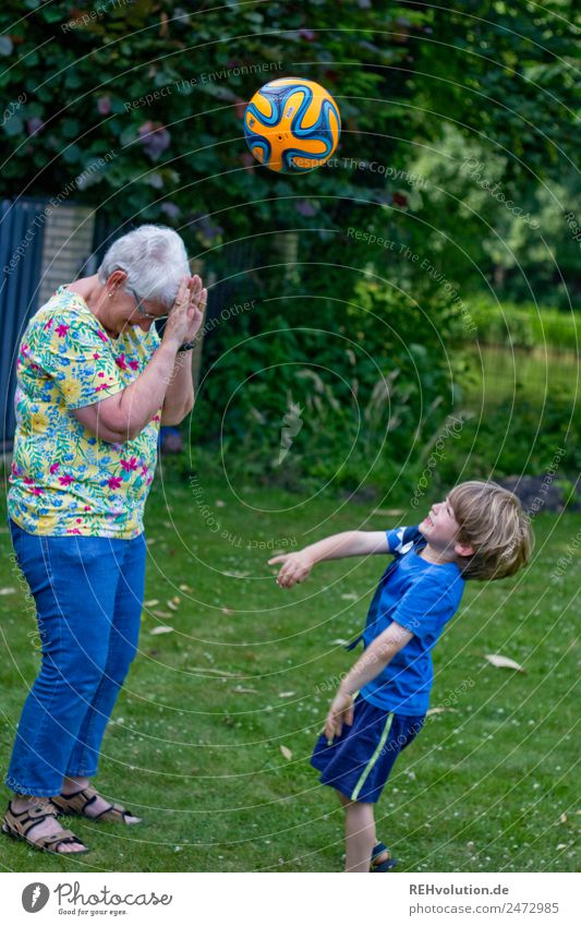 boy throws a ball at grandma Leisure and hobbies Children's game Ball sports Human being Masculine Feminine Boy (child) Female senior Woman Grandmother