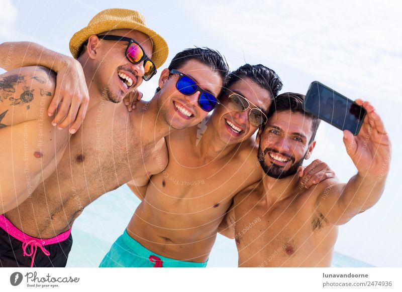 Four latin men taking a selfie at the beach Lifestyle Style Joy Vacation & Travel Tourism Sun Beach Homosexual Man Adults Friendship Couple Fashion Sunglasses