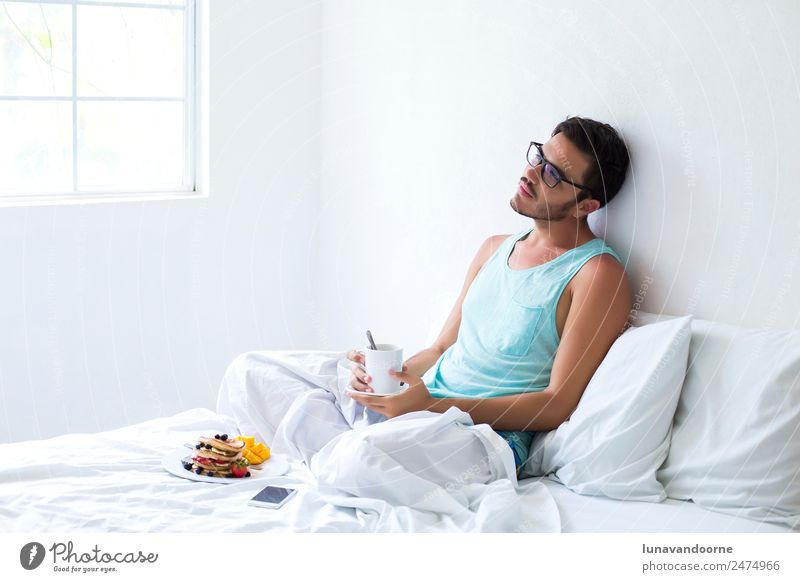 Latin man having breakfast in bed Dessert Breakfast Lunch Coffee Plate Calm Homosexual Man Adults Delicious White Loneliness Personal hygiene Berries blogger