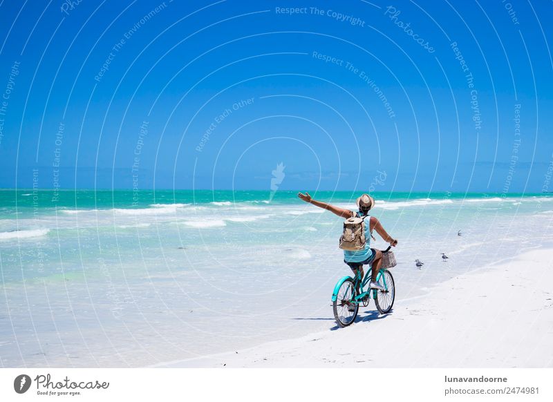 Man riding a bike on the sea shore. Lifestyle Joy Relaxation Vacation & Travel Freedom Summer Sun Beach Sports Cycling Homosexual Adults 1 Human being
