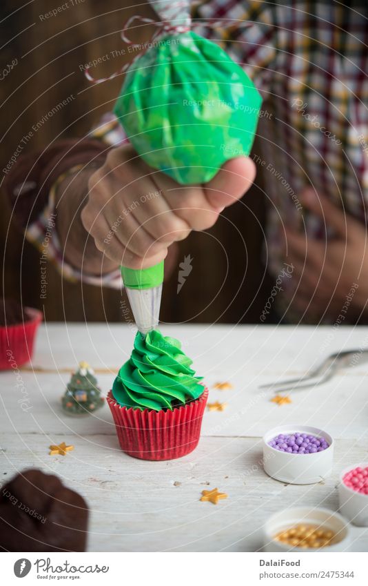 Making cupcake for christmas time Dessert Winter Decoration Feasts & Celebrations Christmas & Advent Tree Bright Green White Colour background Baking colorful