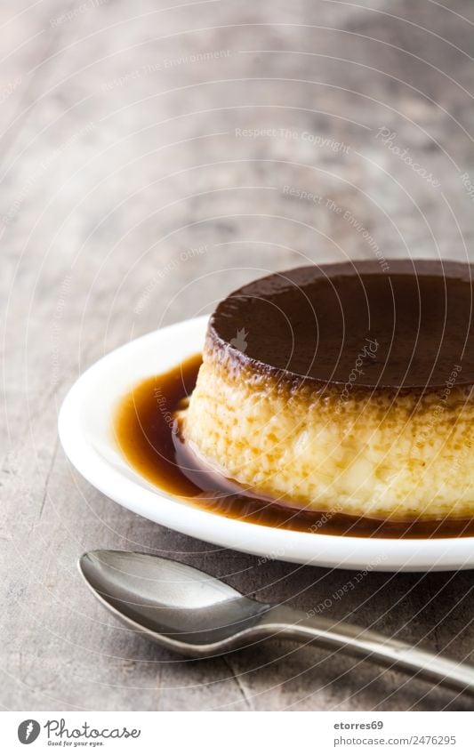 Creme caramel. Egg pudding on wooden table Food Dairy Products Dessert Candy Nutrition Eating Breakfast Lunch Wood Natural Brown Cream Caramel Pudding French