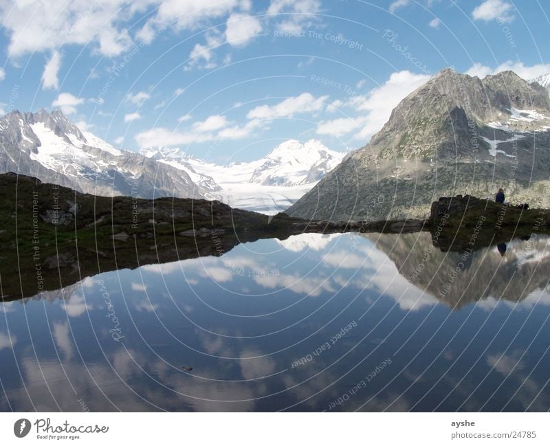 Peace and space Mountain lake Glacier Reflection Clouds Landscape Wide angle Aletsch glacier Switzerland mountains