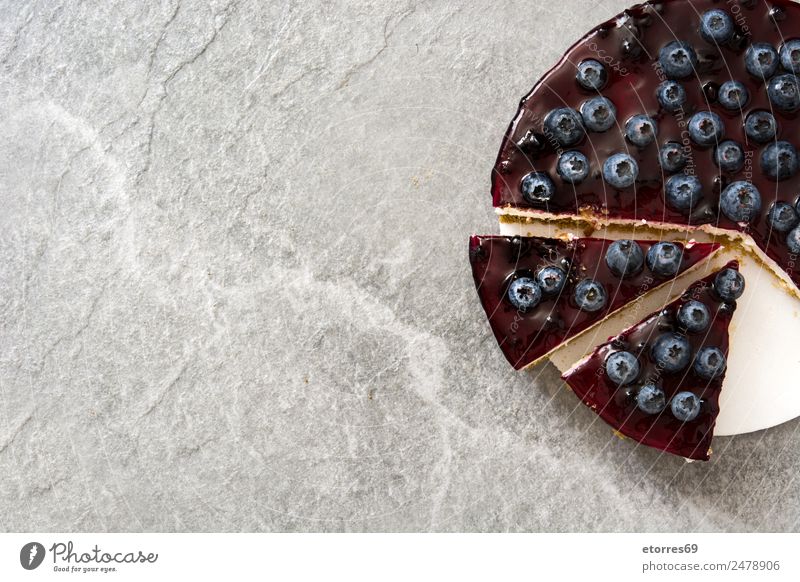 Piece of blueberry cheesecake on gray stone Cheese Blueberry Baked goods Cake Dessert Fruit Sweet Candy Food Healthy Eating Food photograph Baking Creamy