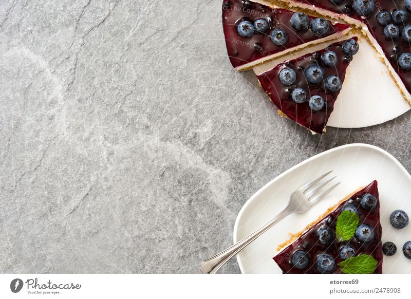 Piece of blueberry cheesecake on gray stone Food Cheese Fruit Cake Dessert Healthy Eating Stone Sweet Gray Blueberry Baked goods Candy Food photograph Baking