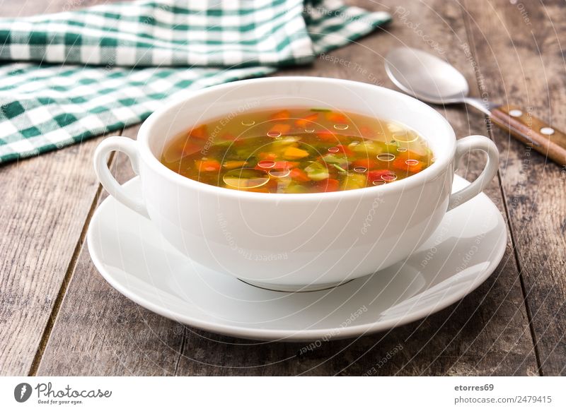 Vegetable soup in bowl on wooden table Soup Food Healthy Eating Food photograph Beverage Drinking Hot Vegetarian diet Vegan diet Diet Nutrition Carrot Zucchini