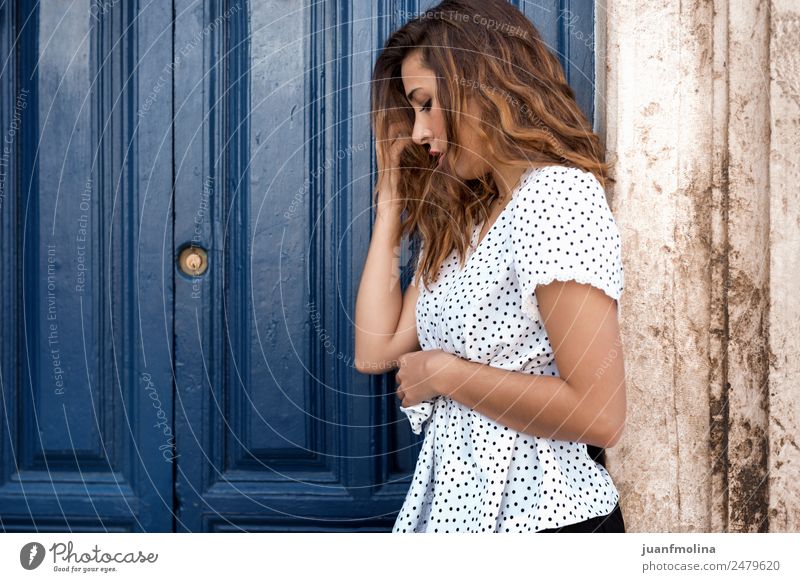 Thoughtful woman next to a door Lifestyle Elegant Style 18 - 30 years Youth (Young adults) Adults Door Fashion Relaxation