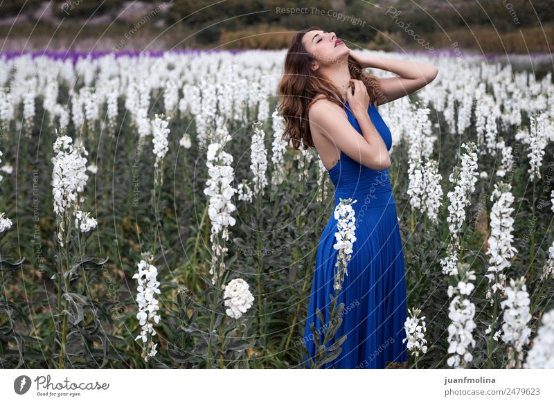 Woman posing in field of white flowers Lifestyle Adults 18 - 30 years Youth (Young adults) Garden Fashion Green White