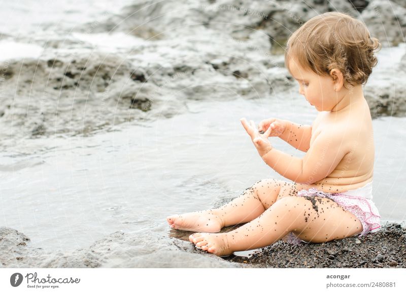 Baby playing on the beach Beautiful Playing Vacation & Travel Summer Beach Ocean Child Human being Feminine Girl 1 0 - 12 months Sand Discover To enjoy Black
