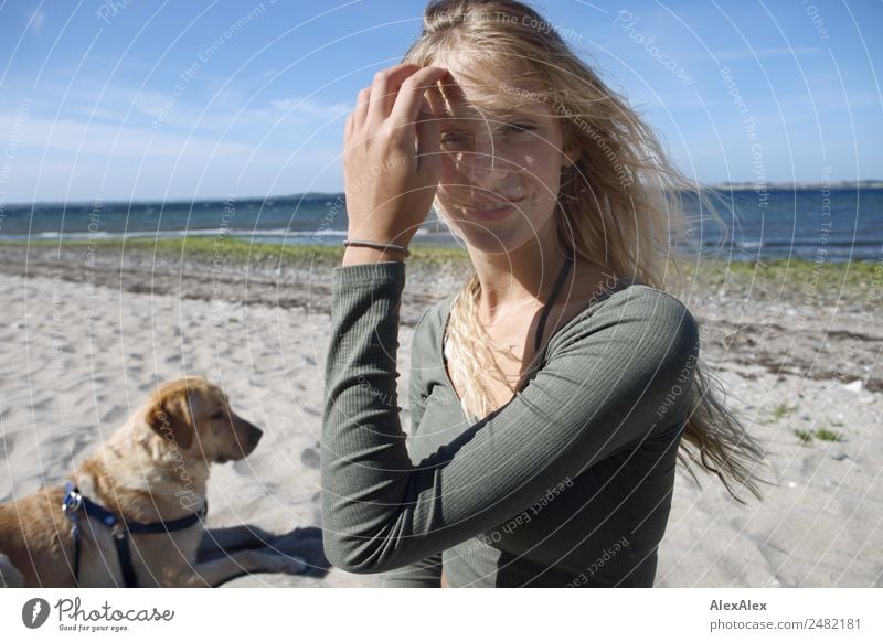 Young woman with blond Labrador at the Baltic Sea beach Lifestyle pretty Harmonious Summer Summer vacation Sun Sunbathing Beach Ocean Youth (Young adults)