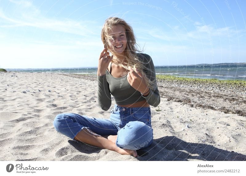 Blonde, young woman at the Baltic Sea beach with blowing hair Lifestyle Joy Happy pretty Well-being Summer Summer vacation Sun Sunbathing Beach Ocean
