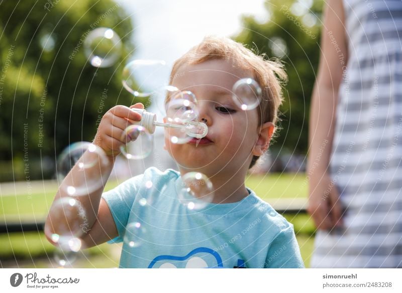 Blown out of the Bubble Joy Toddler Boy (child) 1 - 3 years Playing Happiness Spring fever Energy Emotions To enjoy Happy bubble Soap bubble Colour photo
