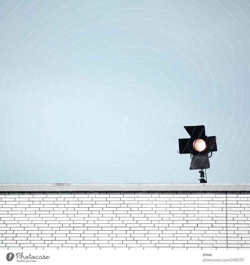 The undaunted illumination of Altona Wall (barrier) Lamp Floodlight Sky Black Lighting Illuminate waste of energy Environmental pollution White Brick Roof