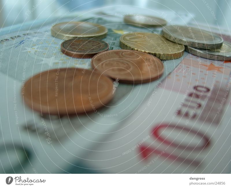 Coins on notes Money Blur Bank note Financial Industry