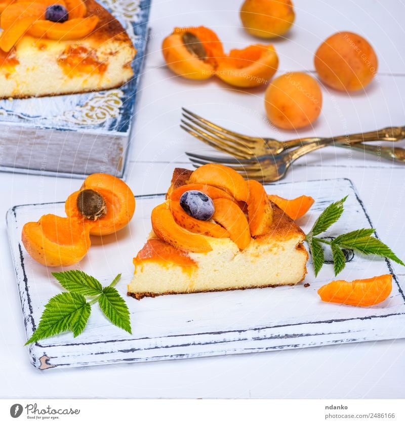 cake from cottage cheese and apricot Fruit Cake Dessert Candy Breakfast Fork Table Eating Fresh Delicious Yellow White appetizing Apricot Baking Bakery