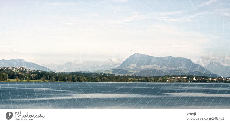 Lakes and mountains Nature Sky Mountain Lakeside Natural Blue Switzerland Far-off places Colour photo Exterior shot Deserted Copy Space top Copy Space bottom