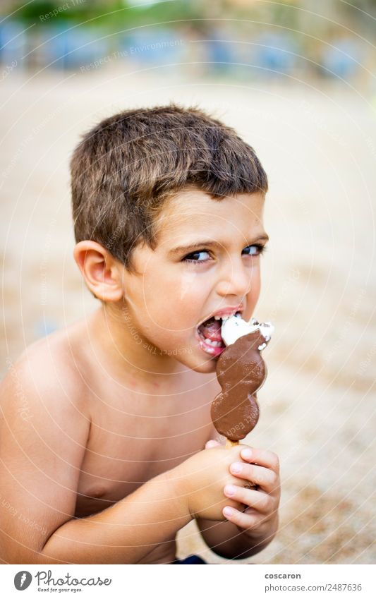 Lovely boy eating an ice cream on the beach Ice cream Chocolate Vacation & Travel Tourism Summer Summer vacation Beach Ocean Human being Child Baby Toddler