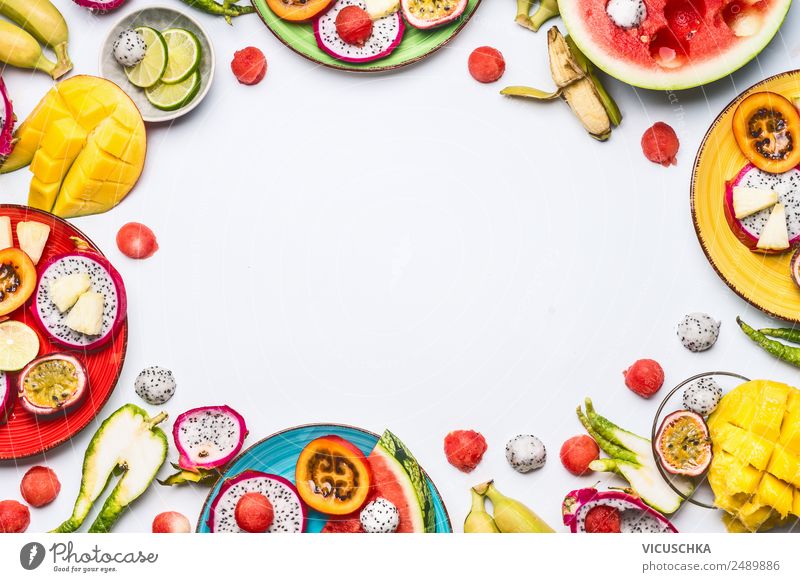 Exotic fruits and fruits cut on plates Food Fruit Apple Orange Nutrition Organic produce Beverage Juice Plate Shopping Style Design Summer Healthy