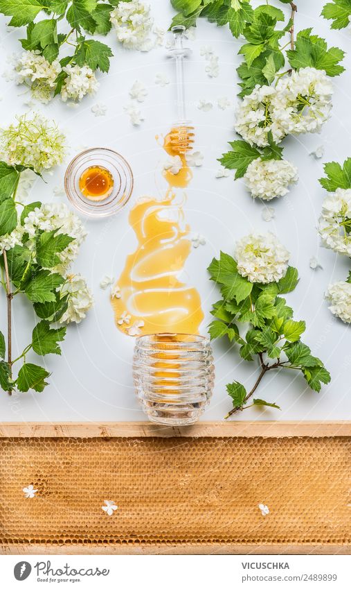 Honey flows from glass and flowers Food Nutrition Organic produce Diet Crockery Style Design Healthy Alternative medicine Healthy Eating Life Summer Table