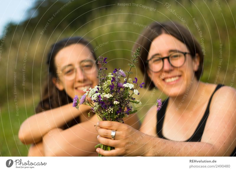 two sisters in the meadow with a bouquet of flowers Lifestyle Healthy Harmonious Well-being Contentment Relaxation Calm Leisure and hobbies Human being Feminine