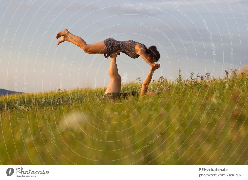 2 women on the meadow Lifestyle Healthy Young woman Leisure and hobbies Fitness Athletic Environment Nature Landscape Summer Meadow Movement Friendship