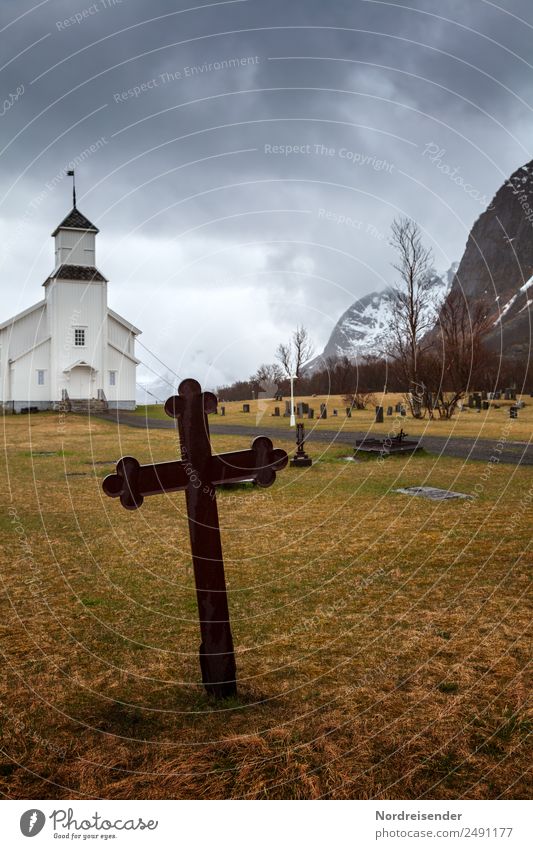 Old iron cross on a nordic cemetery Landscape Storm clouds Autumn Winter Climate Bad weather Rain Meadow Mountain Village Fishing village Small Town Deserted