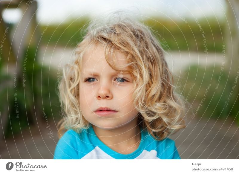 Small child with long blond hair Happy Beautiful Face Summer Child Human being Baby Boy (child) Man Adults Infancy Environment Nature Plant Blonde Smiling Long