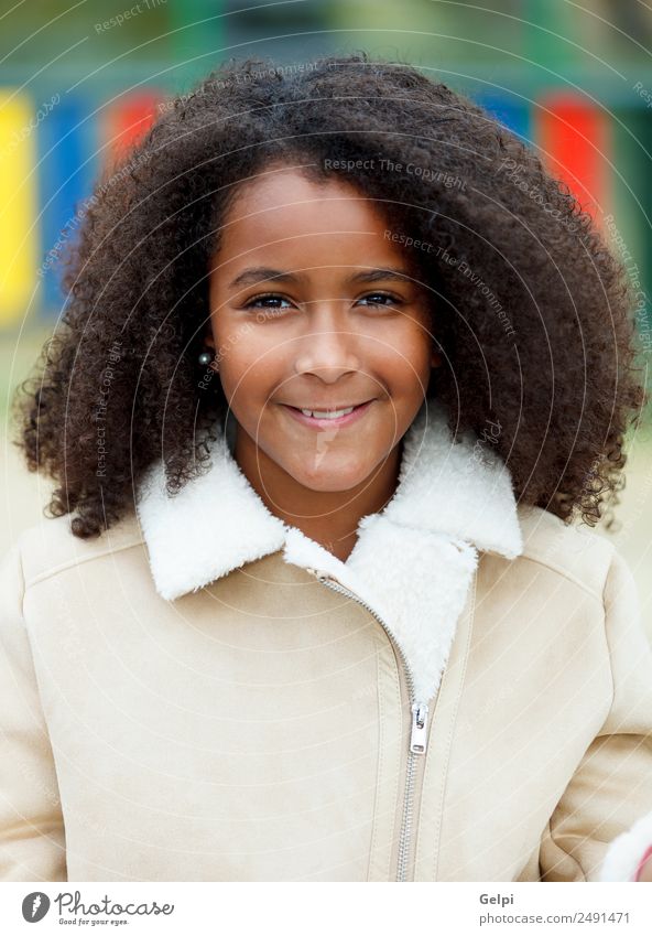 Pretty girl with long afro hair Happy Beautiful Hair and hairstyles Skin Face Child School Woman Adults Sky Warmth Park Coat Afro Cute ten african American