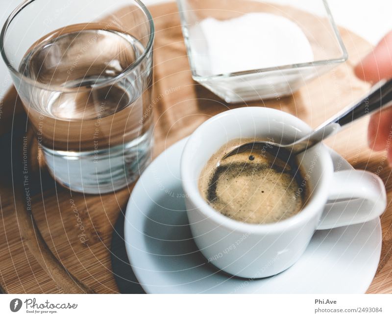 Espresso pleasure. Food Sugar Nutrition Breakfast Lunch To have a coffee Beverage Coffee Water Drinking Hot Stir Glass Colour photo Subdued colour Interior shot