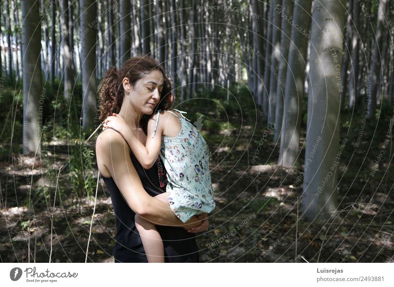 woman hugging her daughter in a forest Lifestyle Healthy Wellness Harmonious Senses Relaxation Feminine Girl 2 Human being 3 - 8 years Child Infancy