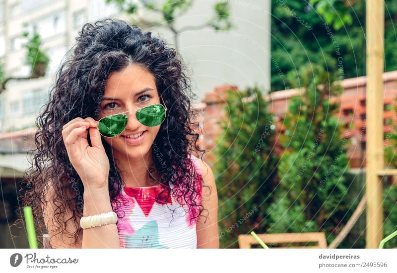 Fashion woman peeking over sunglasses – Jacob Lund Photography Store-  premium stock photo