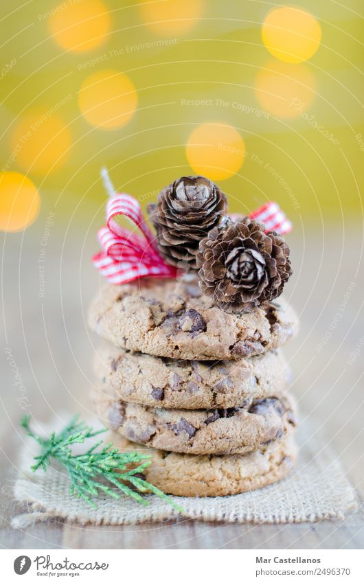 Chocolate chip cookies and Christmas decoration Candy Winter Decoration Table Feasts & Celebrations Christmas & Advent Illuminate Write Sell Delicious Green Red