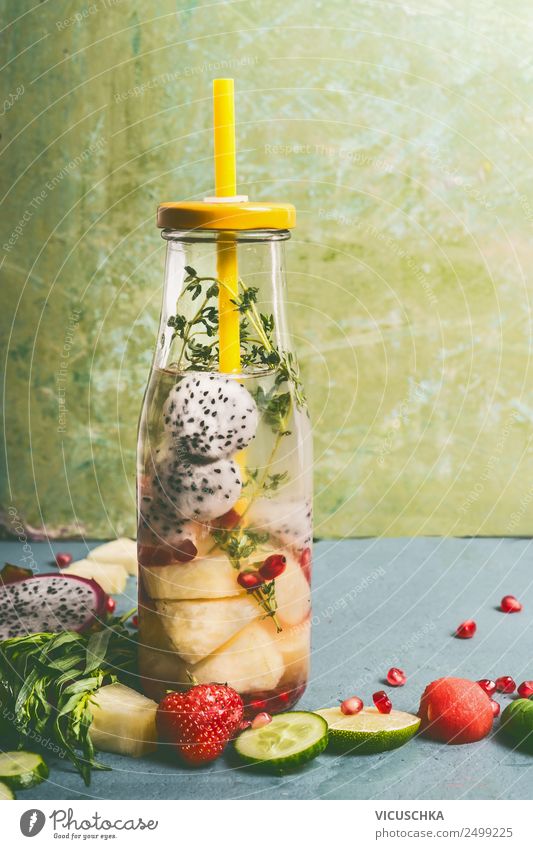 Bottle with fruit and herbs water Food Fruit Herbs and spices Nutrition Organic produce Vegetarian diet Diet Beverage Cold drink Drinking water Style Design