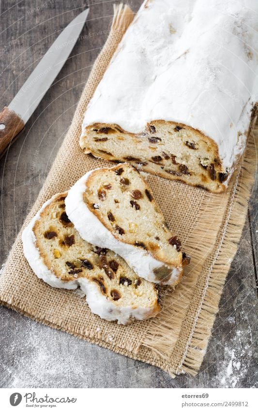 Christmas stollen on wooden table Christmas & Advent Anti-Christmas Stollen Dessert Sweet Candy Tradition Food Healthy Eating Dish Food photograph German