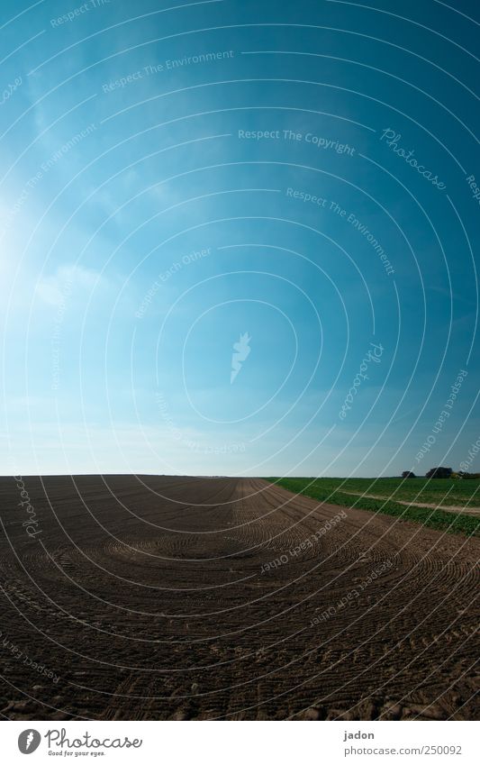 agriculture Art Work of art Landscape Earth Sand Sky Beautiful weather Field Village Tractor Line Round Blue Brown Symmetry Tracks Tire tread Curve Impression