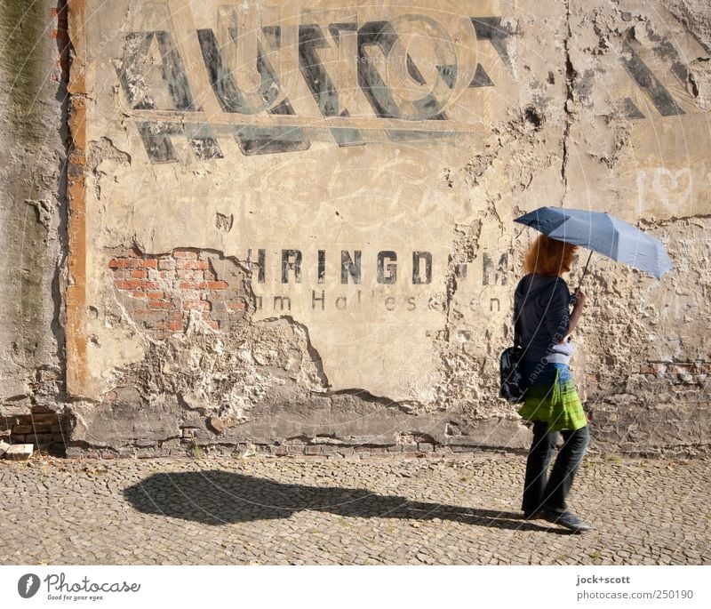 Umbrella in sunshine Style Contentment To go for a walk 45 - 60 years Kreuzberg Wall (barrier) Characters Old Happy Historic Freedom Identity Nostalgia