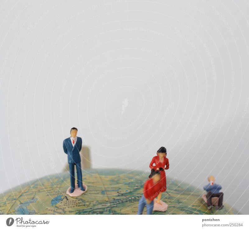 Four people (figures) on a globe. Population. Citizen of the world Human being Masculine 4 Clothing Workwear Tie Crouch Figure Model-making Globe Earth Stand