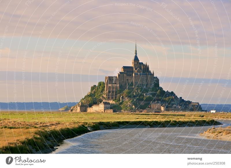 fairytale castle Mont St Michel France Europe Town Old town Church Castle Building Architecture Stone Water Lock Gigantic High tide Low tide Ocean