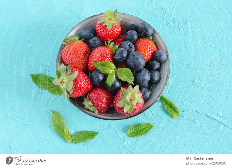 Bowl of strawberries, blueberries and mint leaves Fruit Dessert Nutrition Eating Vegetarian diet Diet Beverage Juice Summer Nature Write Fresh Delicious Natural