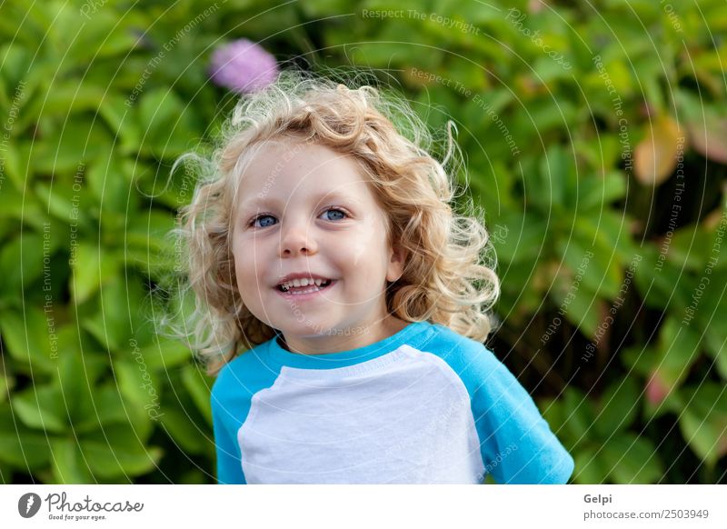 Small child with long blond hair Happy Beautiful Face Summer Child Human being Baby Boy (child) Man Adults Infancy Environment Nature Plant Blonde Smiling Sit