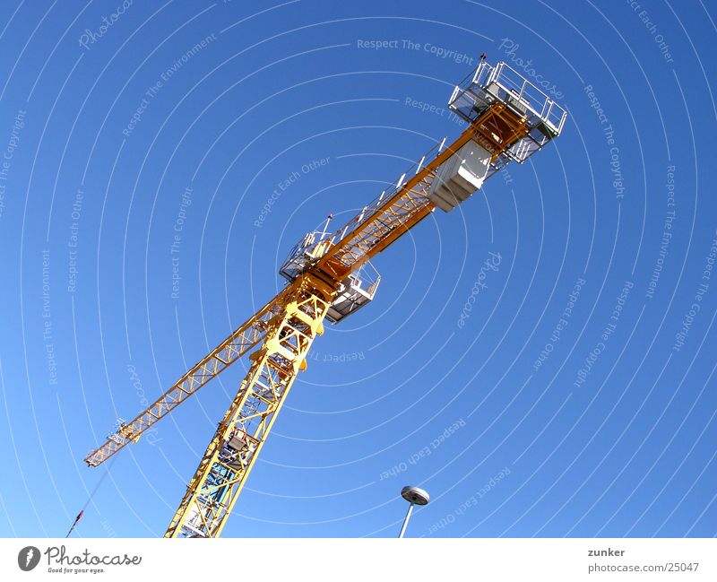 another crane Lamp Yellow Air Aviation clan Sky Beautiful weather Blue Above