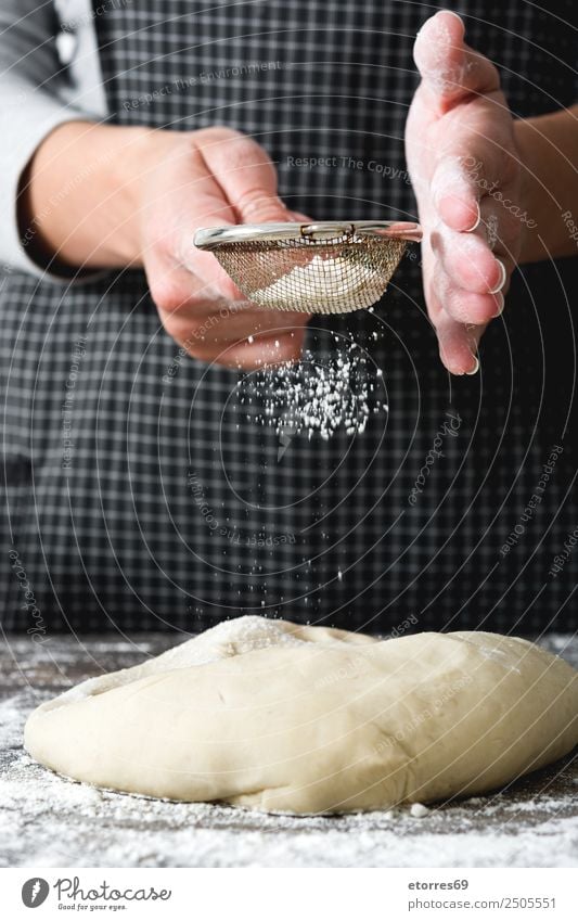 cook sprinkling flour on top of a bread dough Woman Bread Make kneading Hand Kitchen Apron Flour Yeast Home-made Baking Dough Human being Preparation Stir