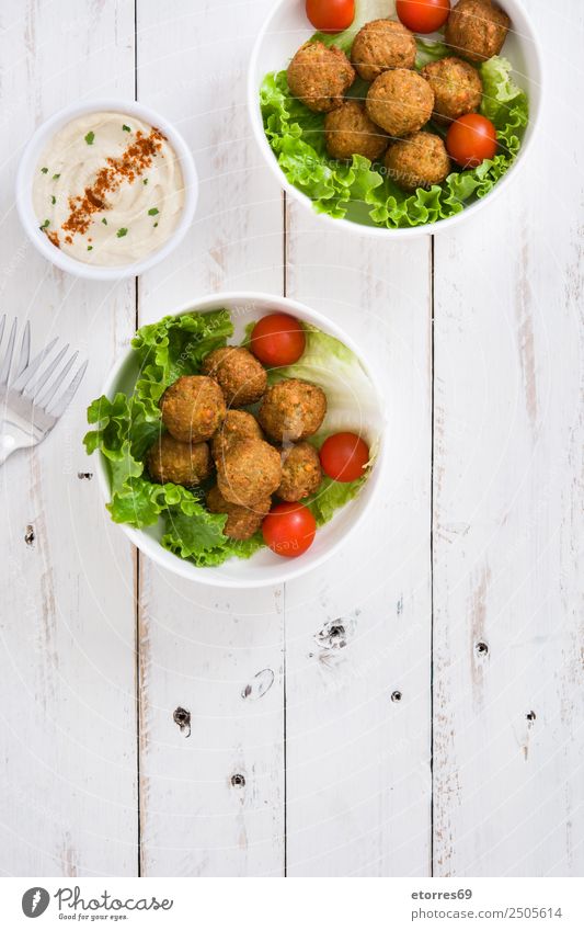 Falafel and vegetables on white wooden background. Top view Food Healthy Eating Food photograph Vegetable Grain Asian Food Bowl Fresh Brown falafel Chickpeas